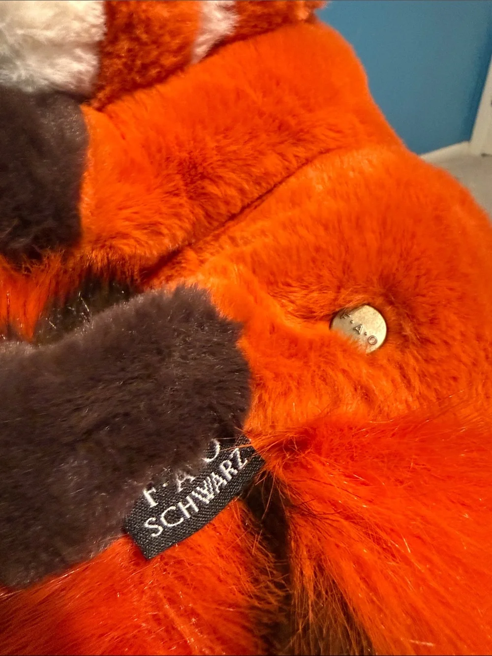 BNWT FAO Schwarz Orange and Black Sleeping Red Panda Plush.